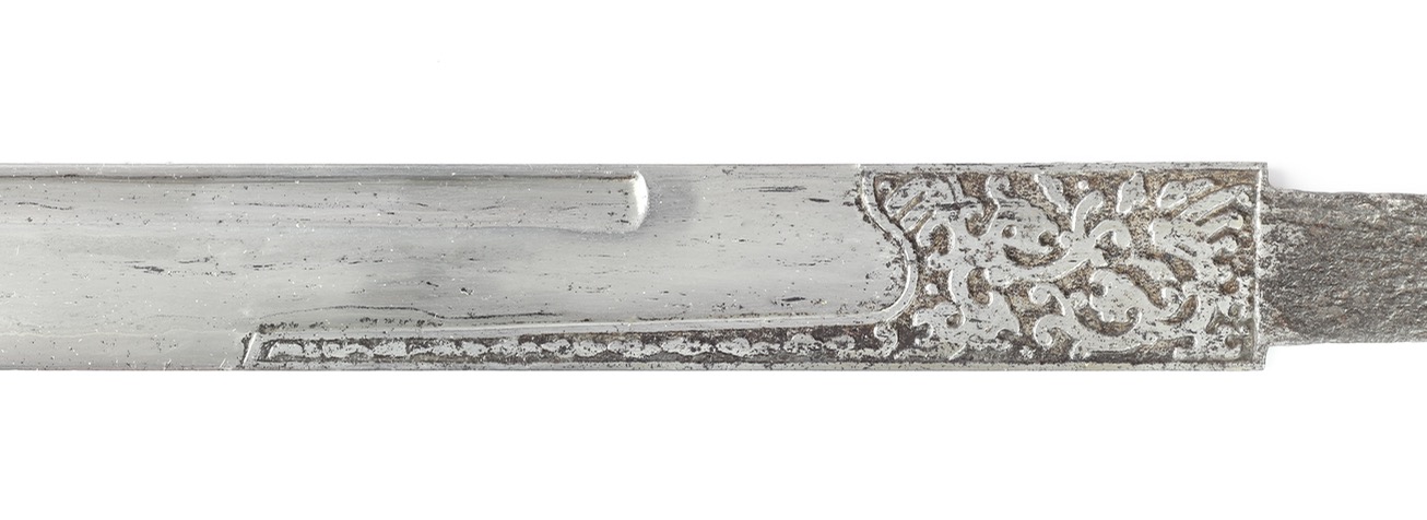 A rare Ming dynasty Chinese saber blade with engraved tunkou