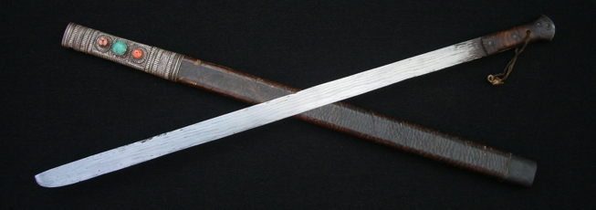 A Jinchuan type sword with unusual deep etching
