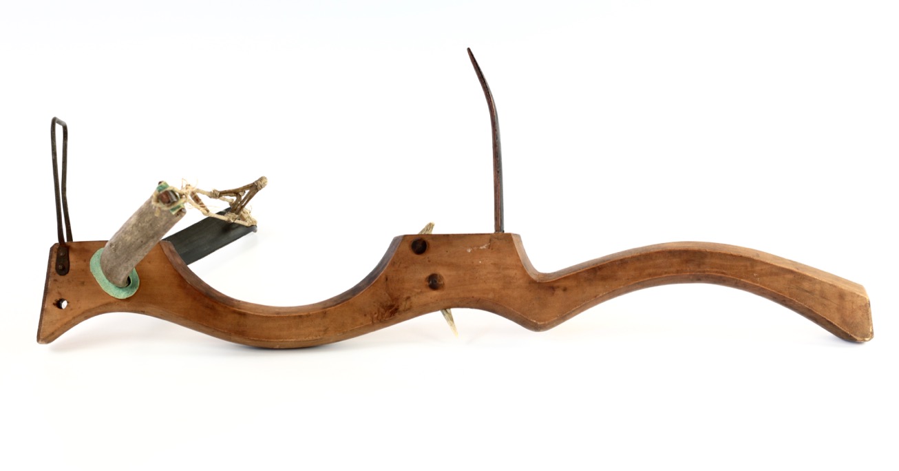 An antique Chinese pellet crossbow.