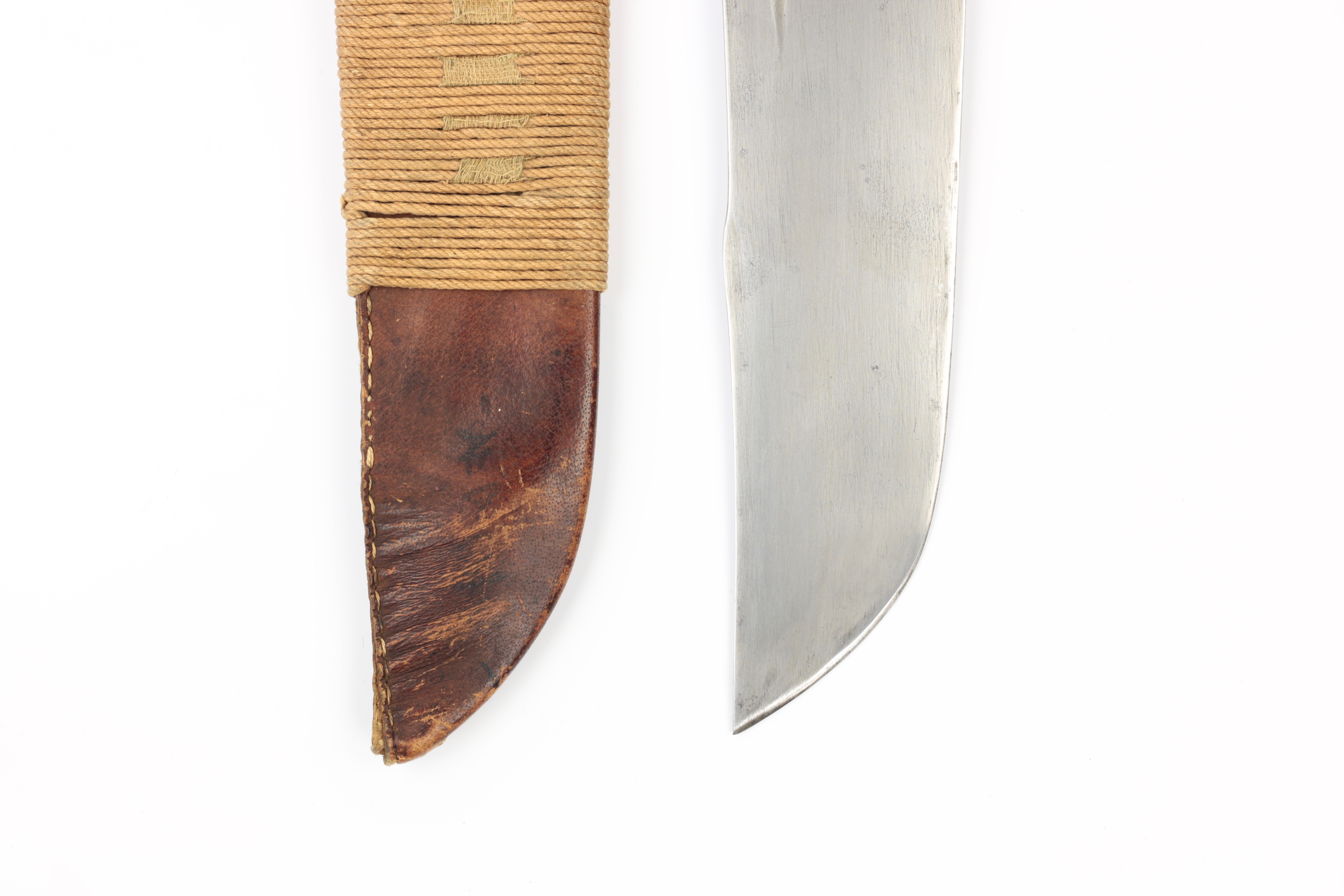 A wide-bladed antique Chinese fighting knife