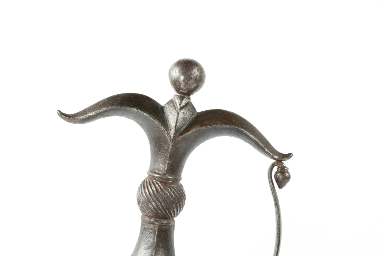 A fine Deccan Chilanum dagger with characteristic all steel hilt. Of robust form with with fine flower bud finials.