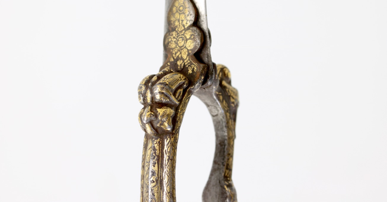 A south Indian bichwa dagger with chiseled iron handle