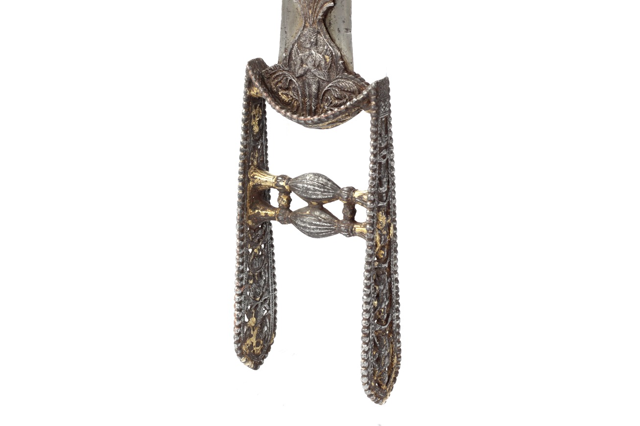 A south Indian katar, Tanjore style, with ten avatars of Vishnu chiseled out of the handle.