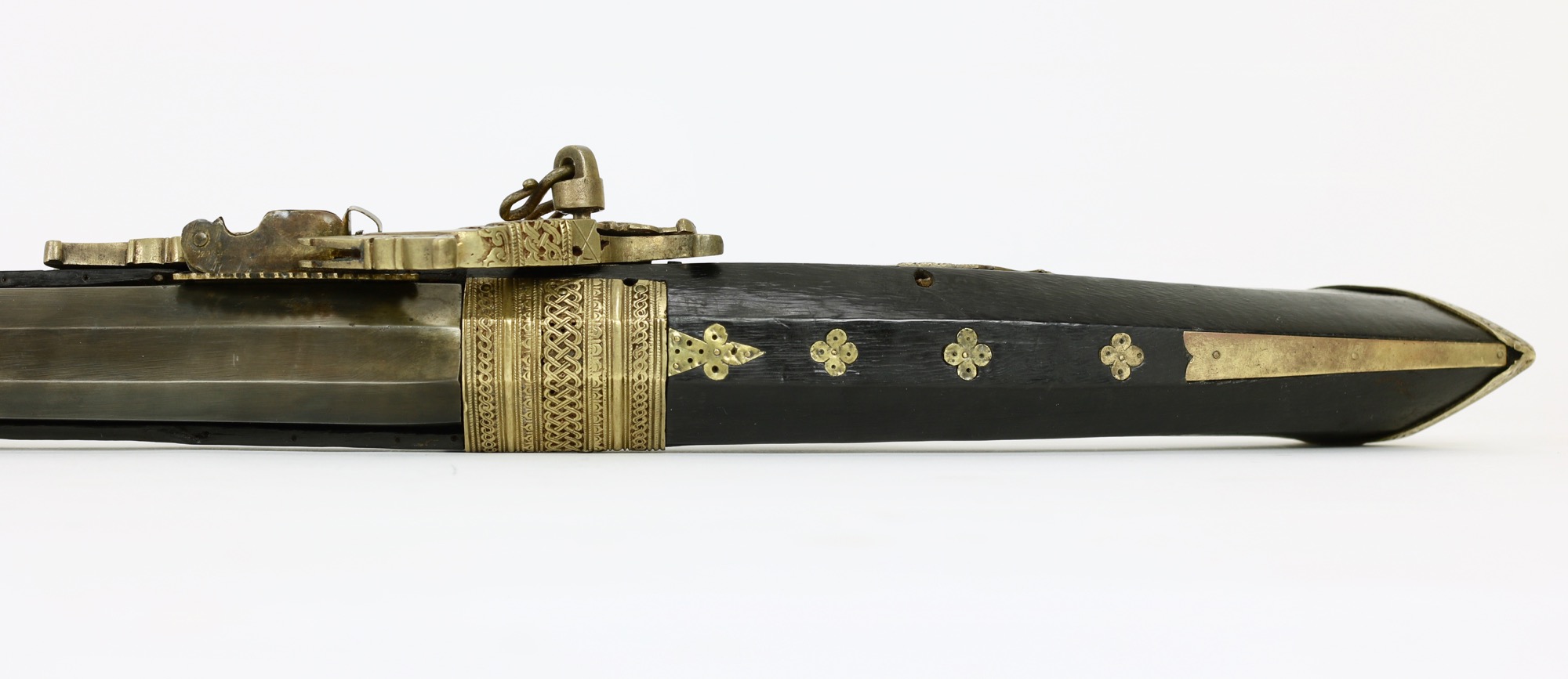 An antique Malaysian matchlock musket. www.mandarinmansion.com