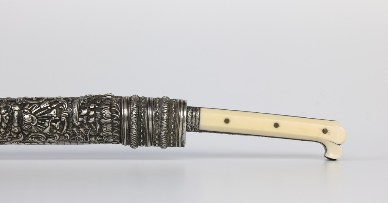 An Ottoman bichaq knife with silver repousse scabbard of the 19th century. wwww.mandarinmansion.com