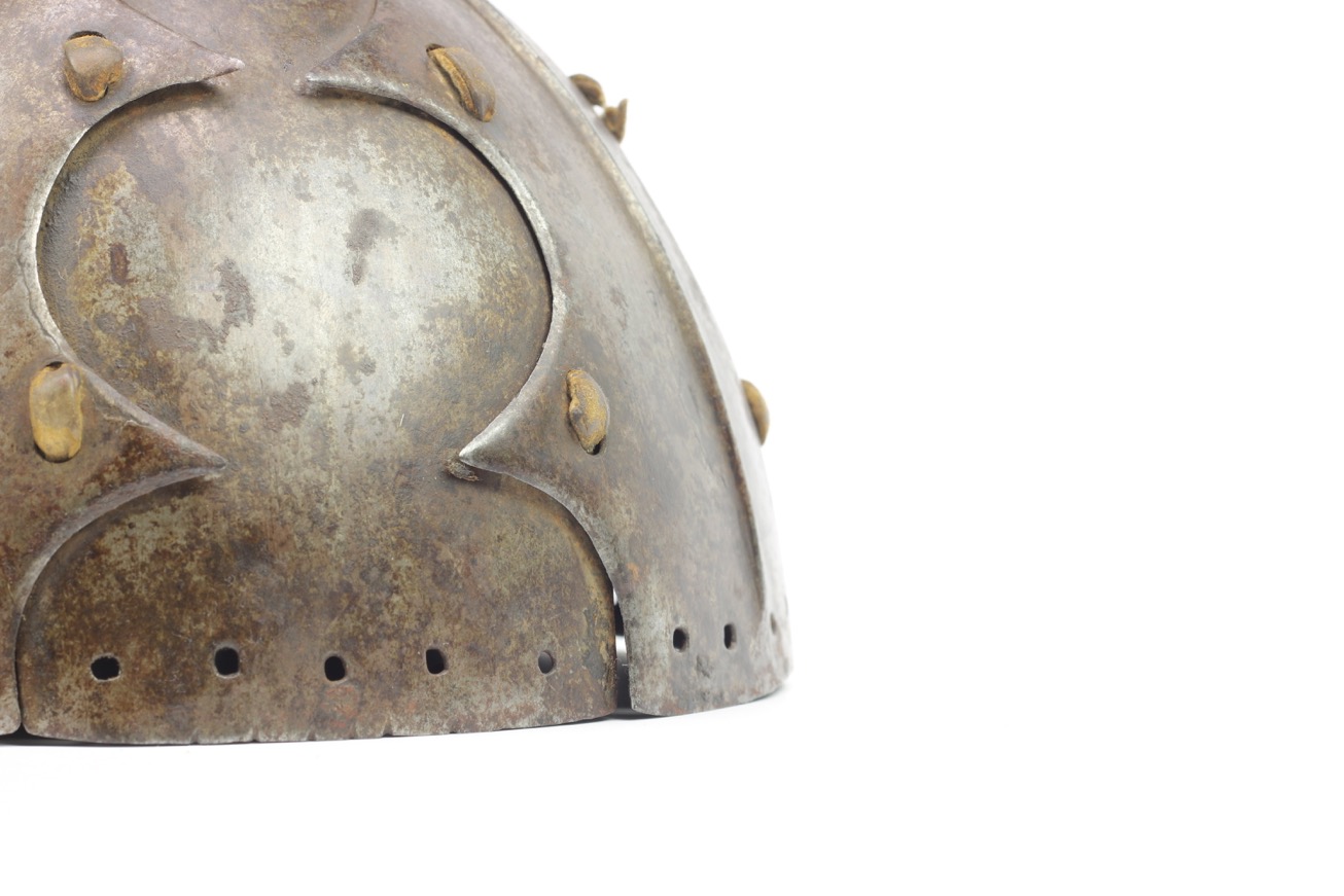 An antique Tibetan eight-plate helmet with partial lamellar armor