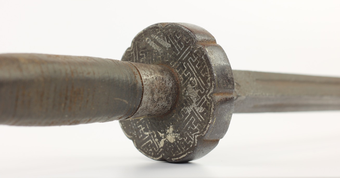 A large Chinese sword breaker of the jian type, a smooth mace.